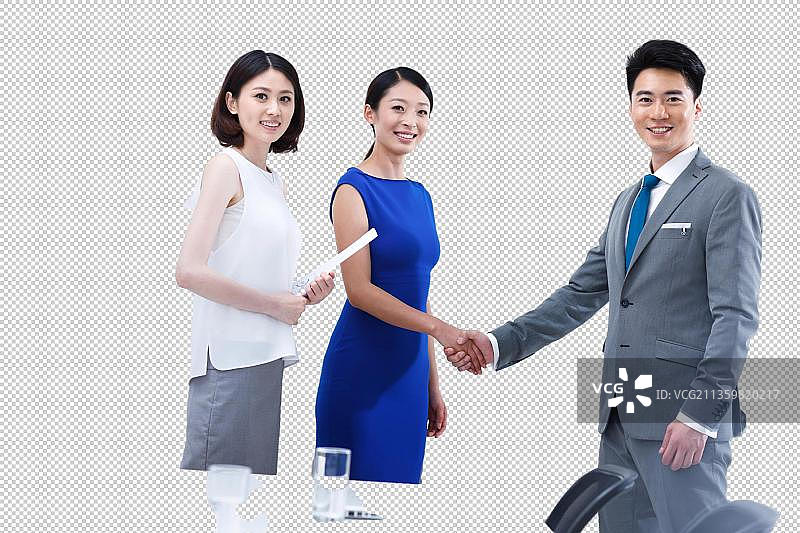 年轻的商务人士在会议室握手图片素材