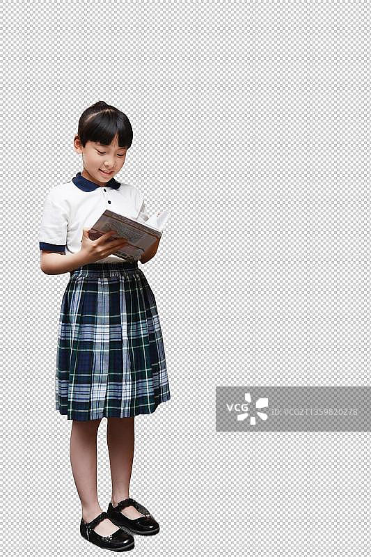 小学女孩在阅览室看书图片素材