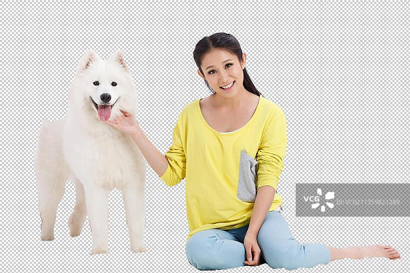 青年女人和宠物狗玩图片素材