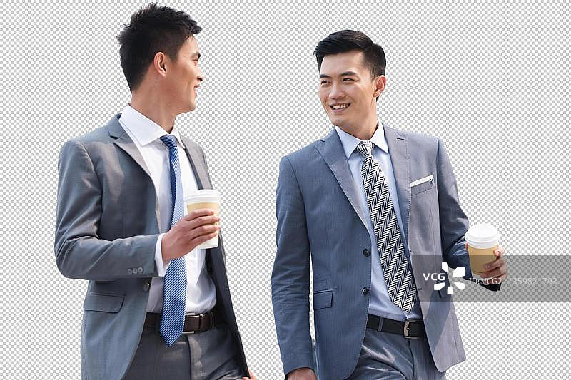 商务男士拿着咖啡杯图片素材
