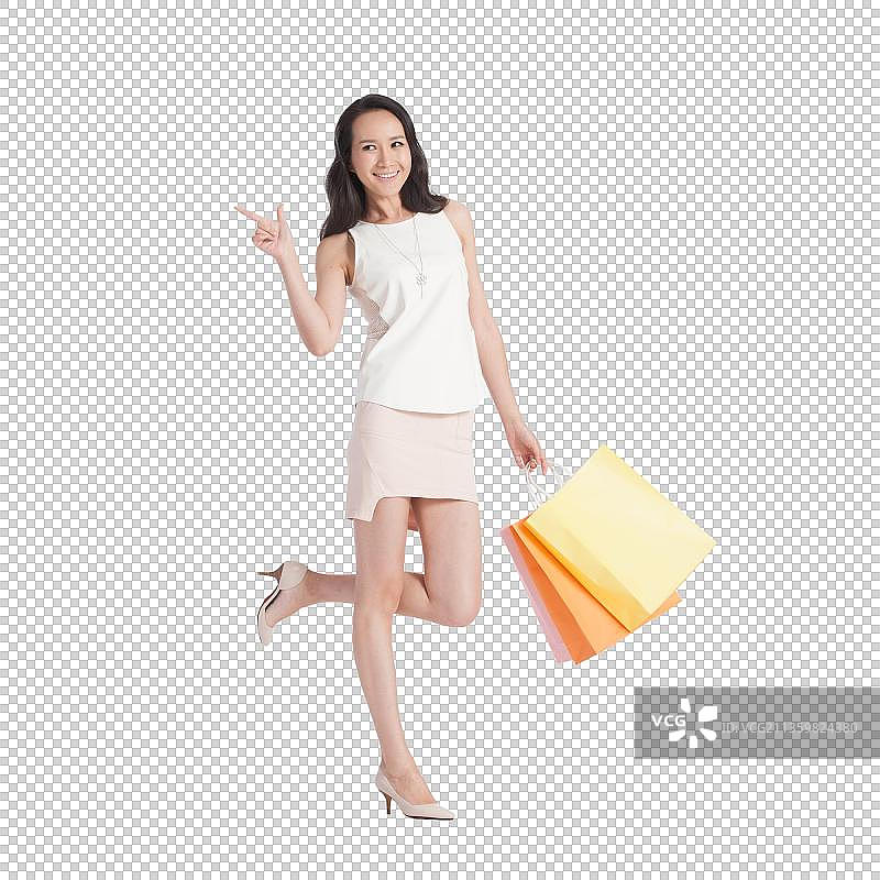 快乐的青年女白领购物图片素材