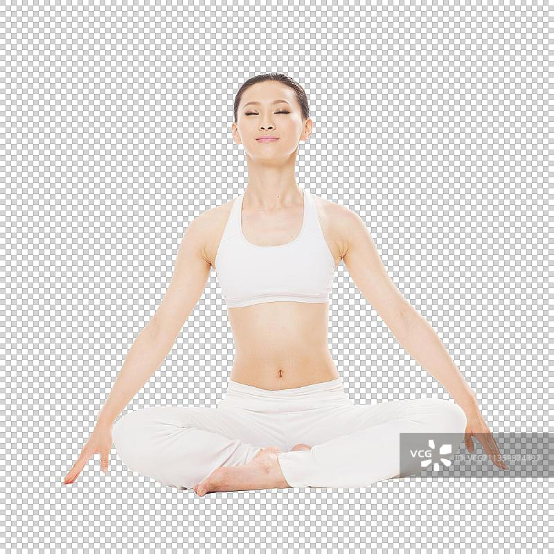 年轻女孩做瑜伽图片素材