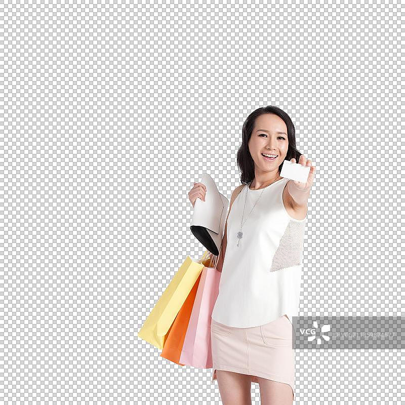 快乐的青年女白领购物图片素材