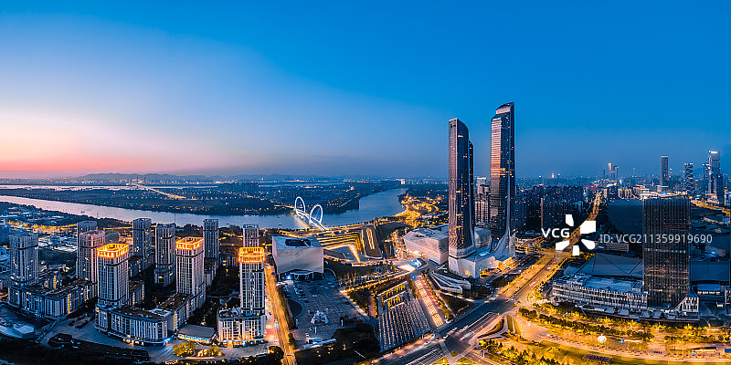 中国江苏南京南京青奥中心和南京眼大桥城市天际线航拍夜景全景图片素材