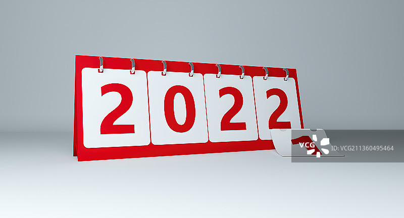 在白色桌面上摆放着2022年台历图片素材