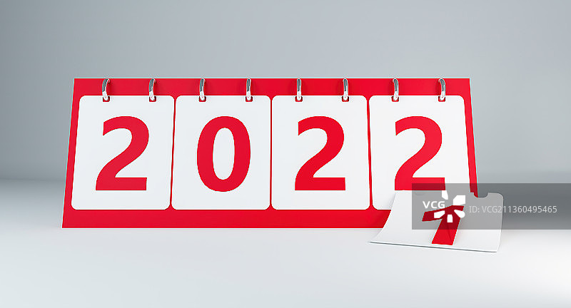 在白色桌面上摆放着2022年台历图片素材