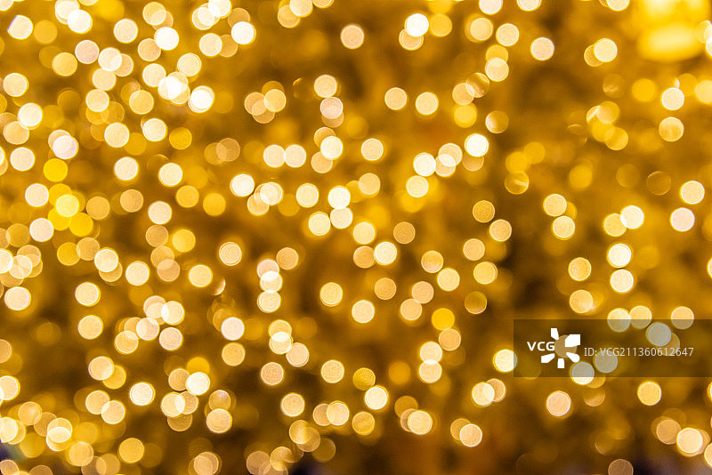模糊虚幻的金色圣诞树光斑粒子图片素材
