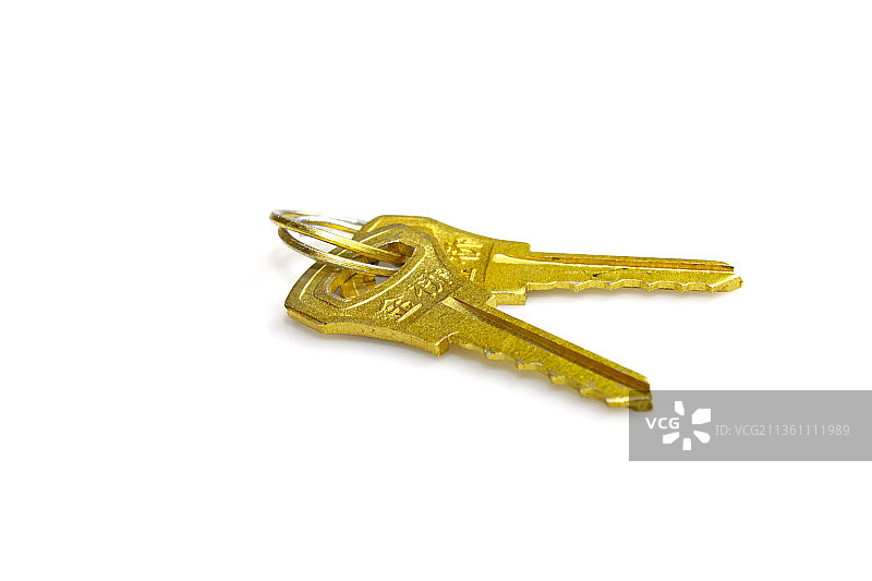 白色背景里的金色钥匙图片素材