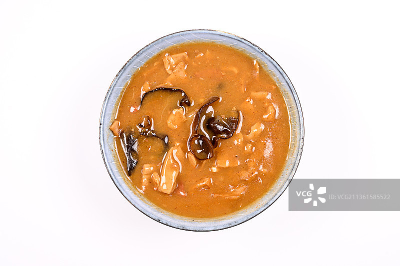 白色背景上的河南特色早餐牛肉胡辣汤图片素材