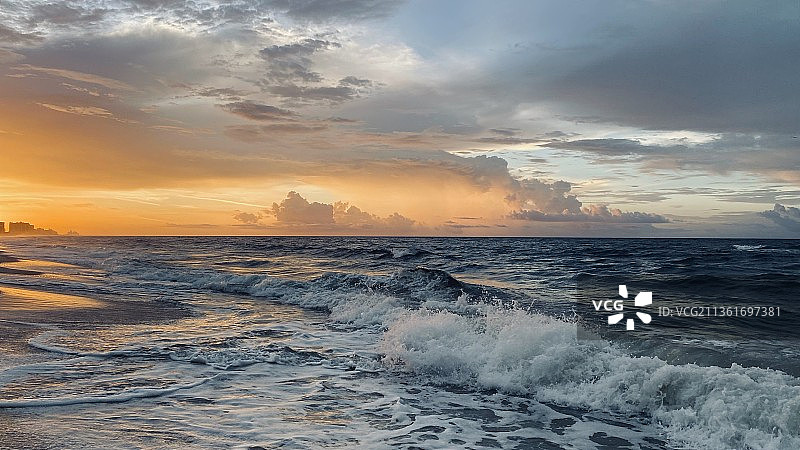 橙色海滩，日落时分阿拉巴马州美国海景图片素材