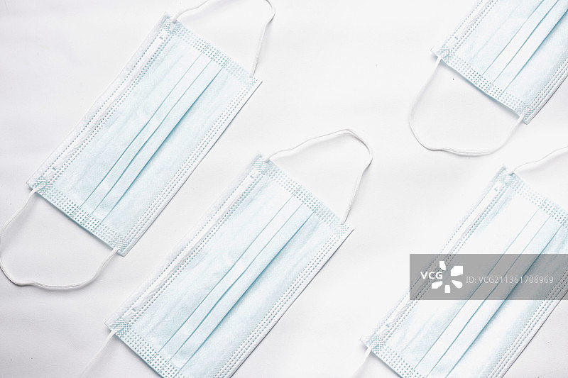 蓝色医用口罩扁平风格照片，印度尼西亚北苏拉威西图片素材
