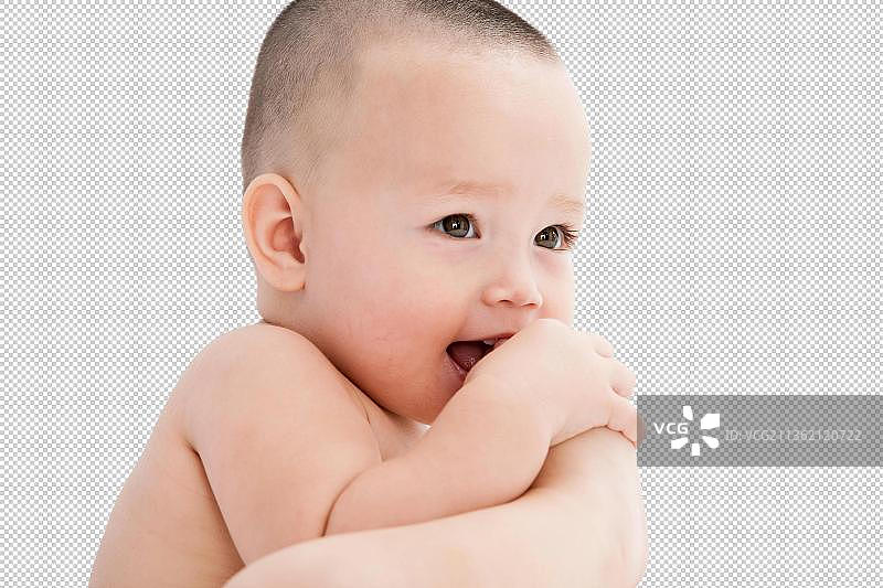 一个婴儿正在吃自己的脚图片素材