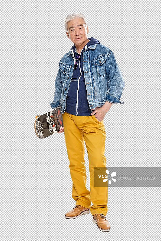 时尚的老年男人拿着滑板图片素材
