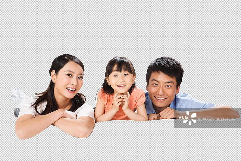 幸福的一家三口在客厅的沙发上趴着图片素材