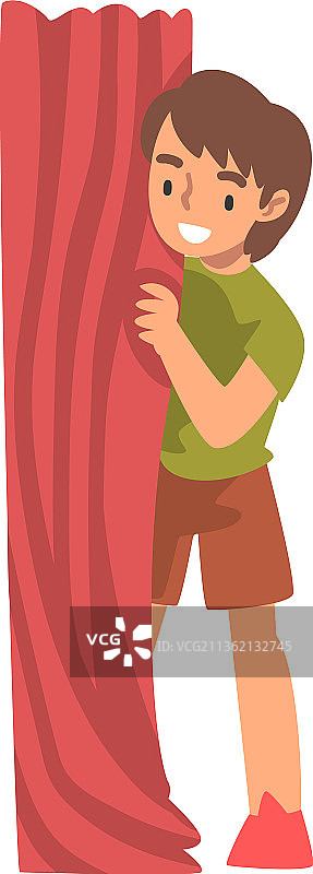 玩捉迷藏躲在后面的小男孩图片素材