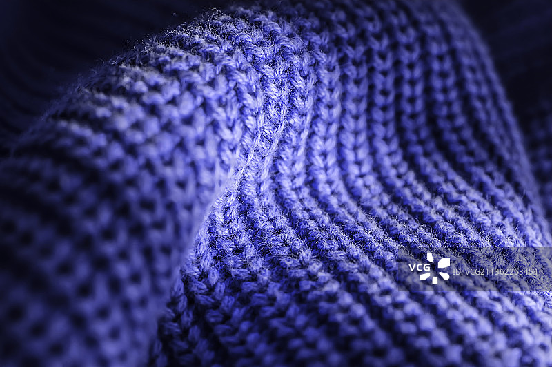 粉色毛衣或围巾的针织纹理特写图片素材