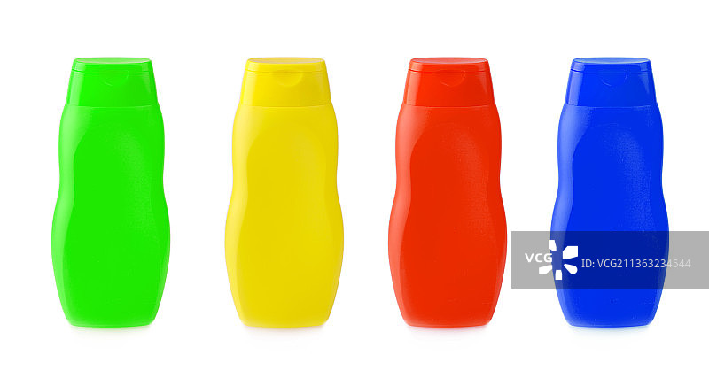 白色背景上的彩色瓶子（特写）图片素材