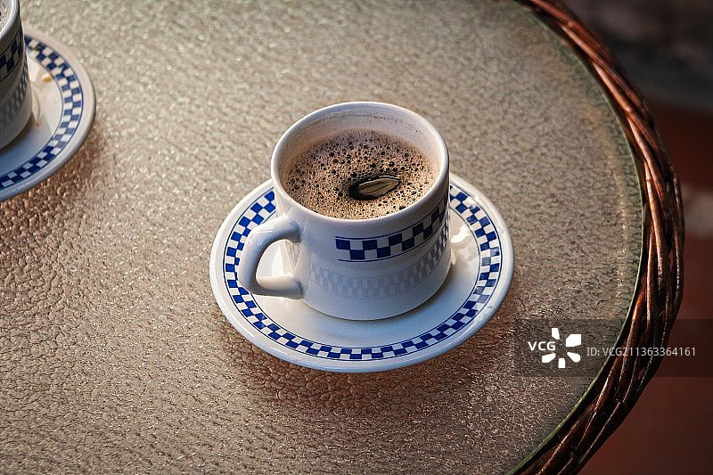 清晨咖啡：北方邦咖啡杯特写图片素材