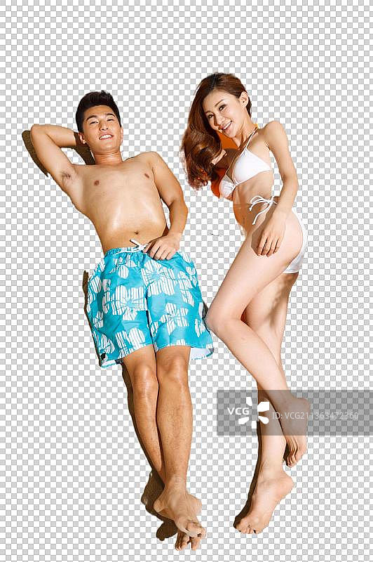 躺在沙滩上的浪漫情侣图片素材