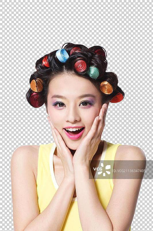 东方青年女人正在烫发图片素材