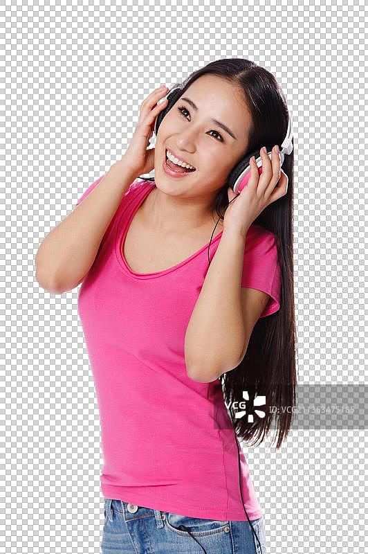 青春活力的年轻女孩听音乐图片素材