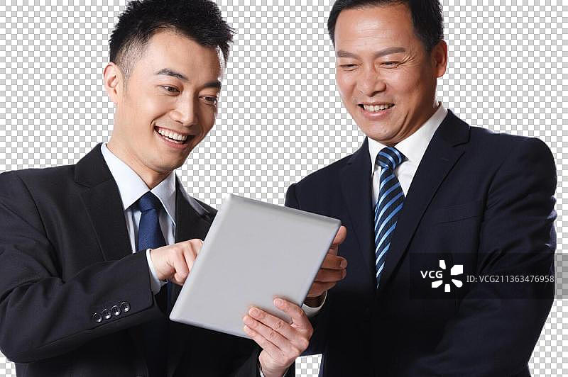 商务男人看平板电脑图片素材