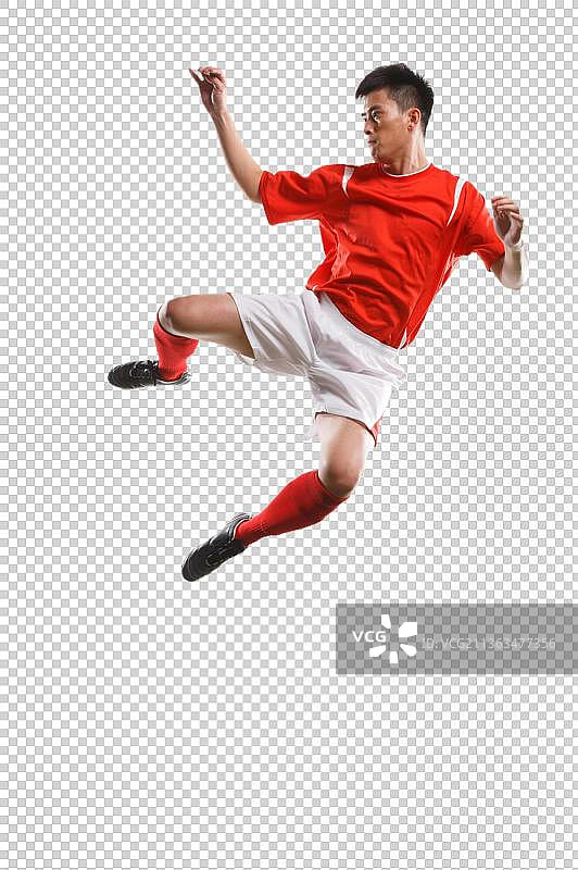 足球运动员踢球图片素材