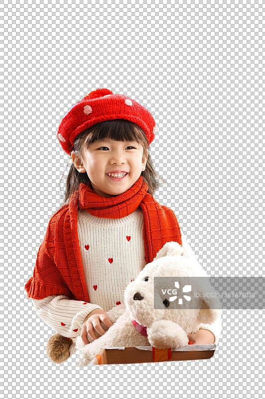 可爱的小女孩拿着玩具熊图片素材