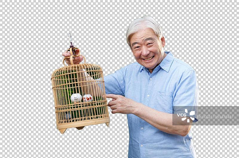休闲的老年男人拿着鸟笼图片素材