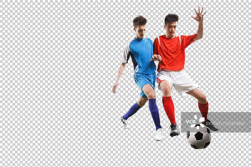 足球运动员踢球图片素材