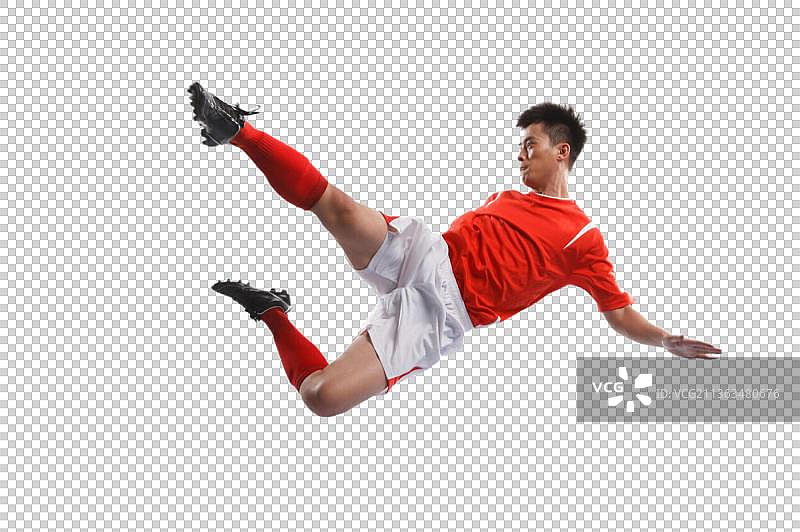 足球运动员踢球图片素材