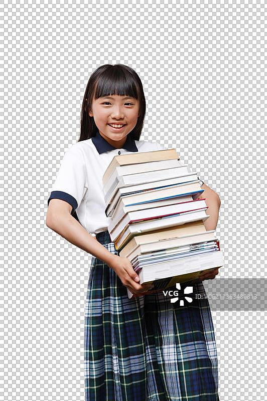小学女生在阅览室抱着大量书籍图片素材