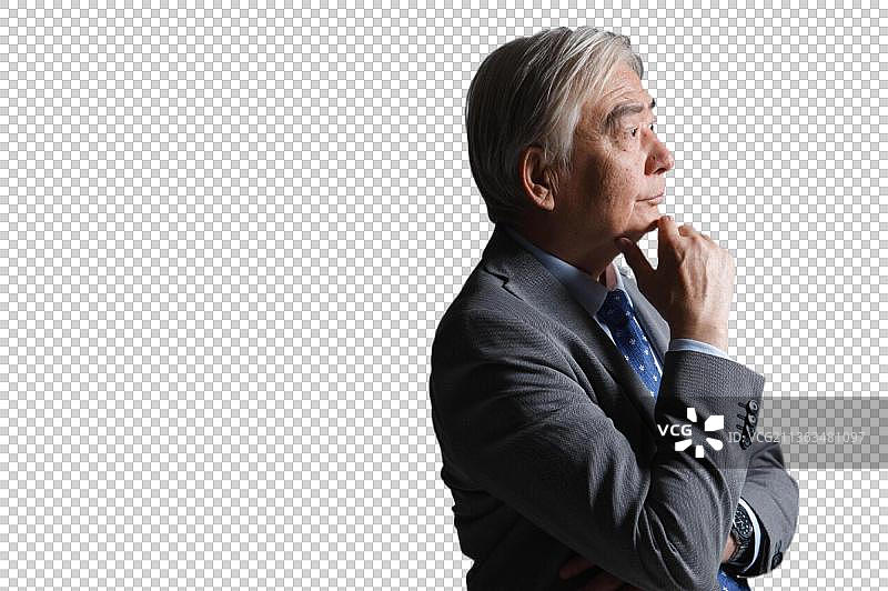 一个成功的老年男人在思考图片素材