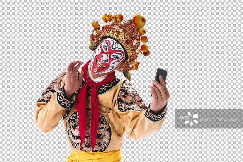 京剧里的人物孙悟空拿着手机图片素材