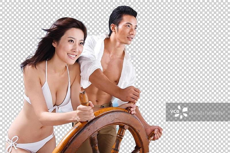 东方人海滩休闲生活图片素材