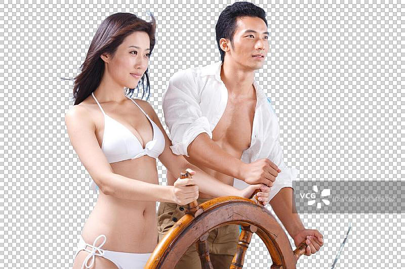 东方人海滩休闲生活图片素材
