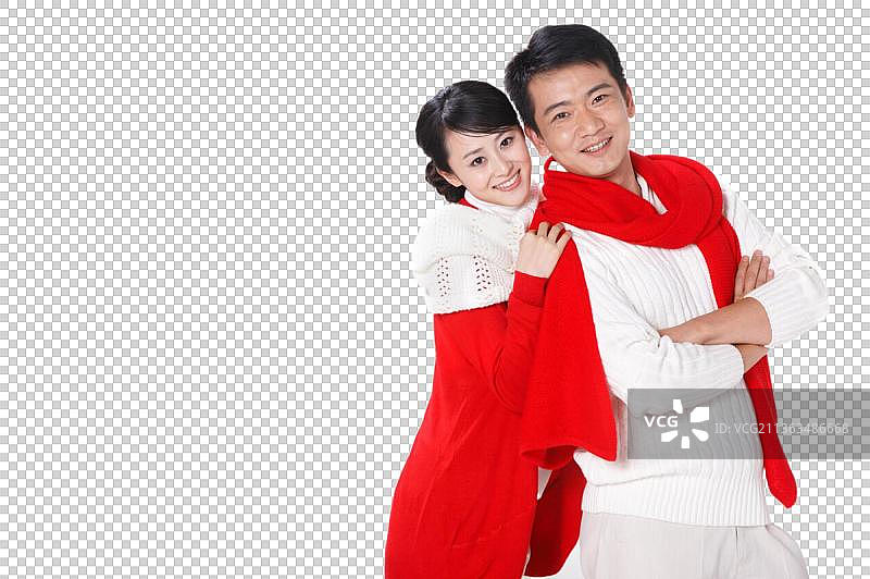 东方夫妇过圣诞节身穿红衣服图片素材