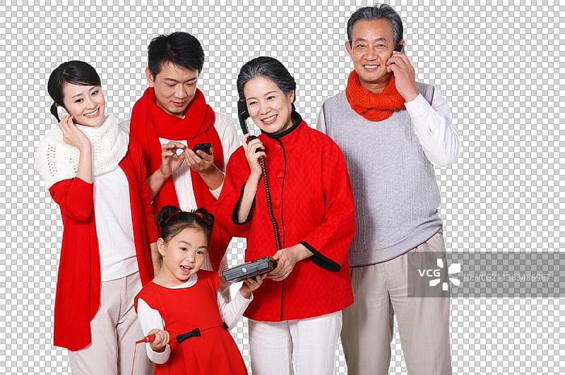东方家庭过年打电话图片素材