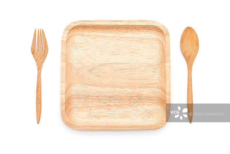 白色背景上的木制餐具俯视图图片素材