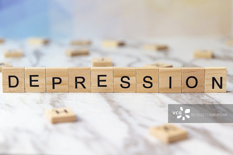 木制字母拼接的单词depression图片素材