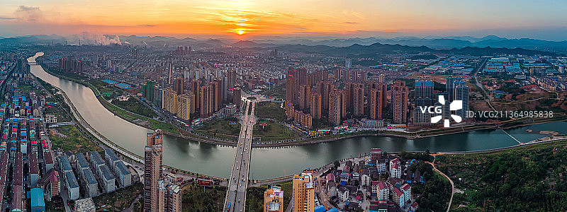 日落夕照下的城市风光全景图图片素材