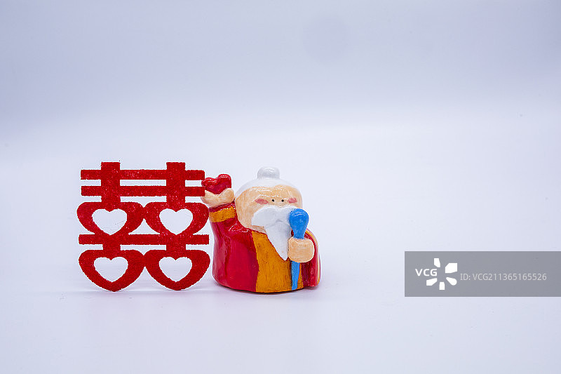 影棚拍摄下的石塑粘土月老图片素材