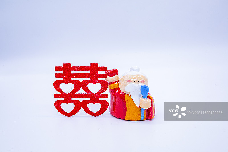 影棚拍摄下的石塑粘土月老图片素材