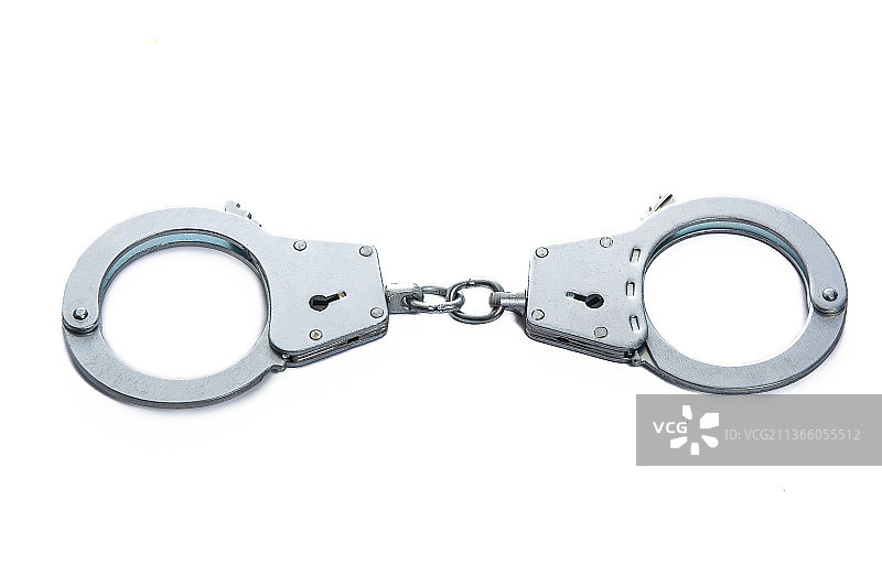 白色背景上的金属手铐图片素材