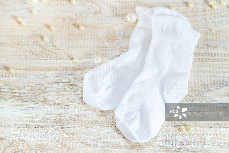 新生婴儿配件的柔美背景，选择性聚焦图片素材