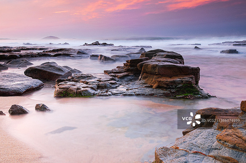 澳大利亚昆士兰穆卢拉巴海滩日落时分的海景图片素材