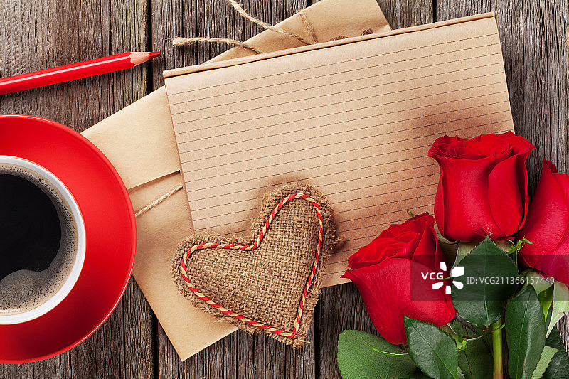 情书记事本、红玫瑰和咖啡杯图片素材