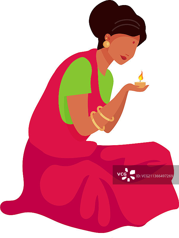 印度女人点燃蜡烛图片素材