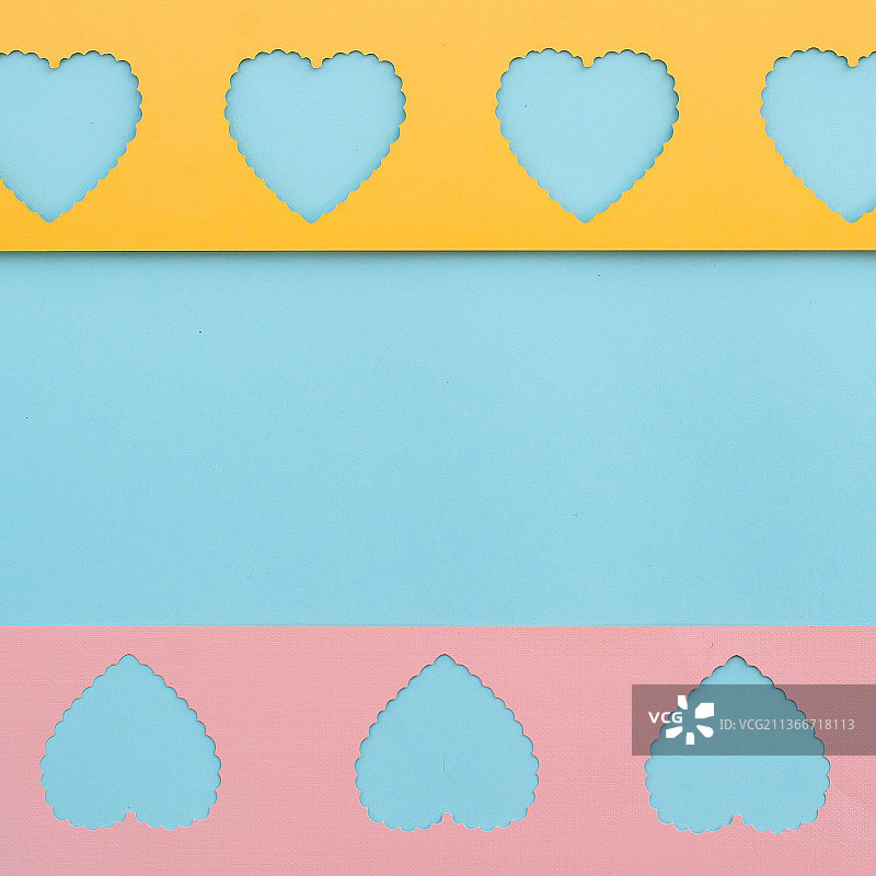 黄粉色心形孔洞纸质重复图案图片素材
