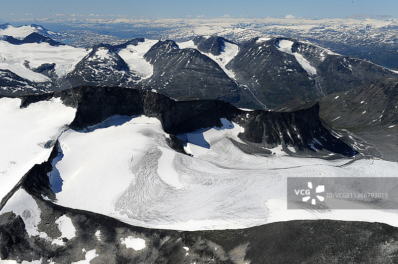 挪威洛姆约通黑门山脉雪山航拍图片素材